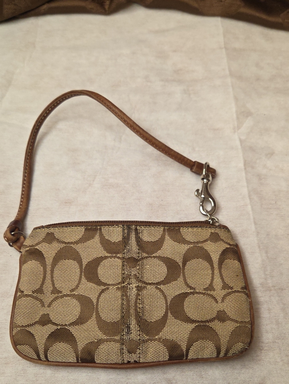 Coach Brown And Tan Logo Wristlet with Leather Strap